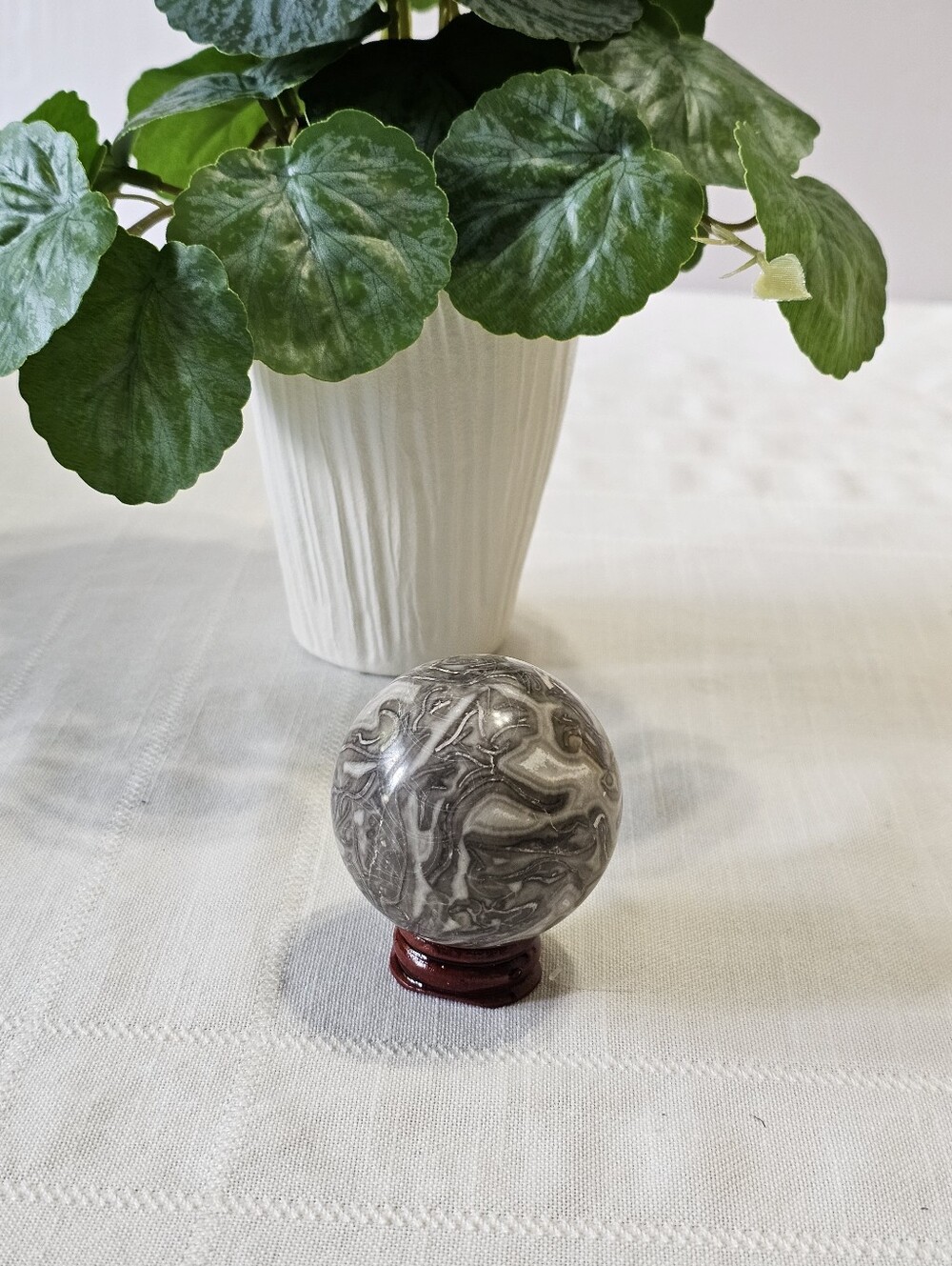Picasso Jasper Sphere on Wood Stand